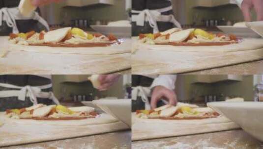 特写把马苏里拉奶酪放在比萨面团上高清在线视频素材下载
