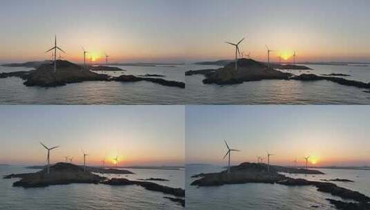 日出海上风车航拍夕阳风车发电风能海上岛屿高清在线视频素材下载