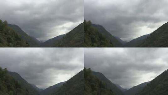 混合森林上方的多云天空高清在线视频素材下载