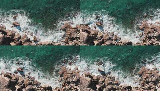 白色海浪撞击岩石海岸高清在线视频素材下载