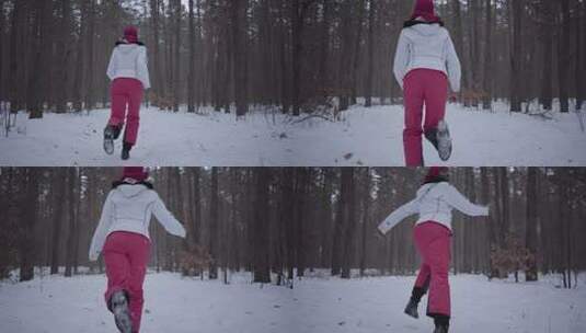 跑过冬季森林的非裔美国女孩。穿着温暖夹克的美丽女孩转身环顾四周，她很害怕。女人被看不见的追逐者追逐高清在线视频素材下载