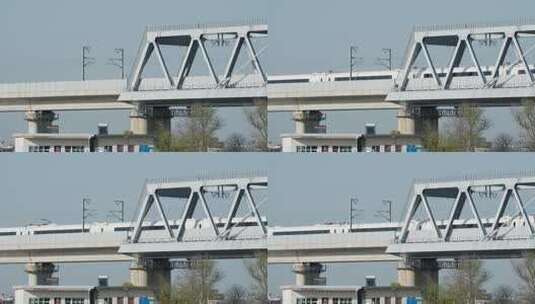 高铁动车飞速驶过高架桥铁轨铁路运输高清在线视频素材下载