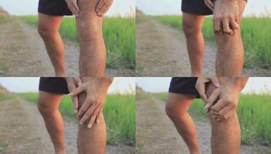 一男子户外跑步膝盖受伤按摩膝盖高清在线视频素材下载