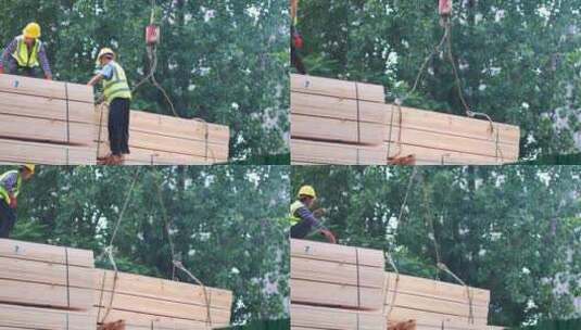 木材厂工人用吊车运输木料3高清在线视频素材下载