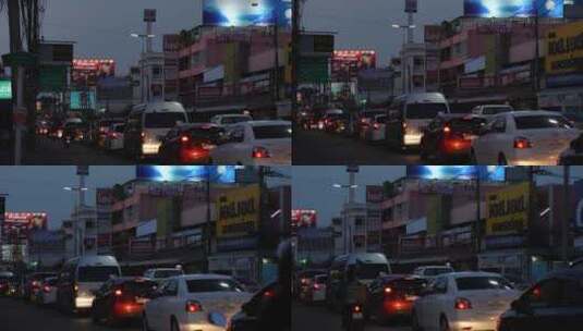 泰国曼谷城市郊外郊区城镇晚霞落日车辆汽车高清在线视频素材下载