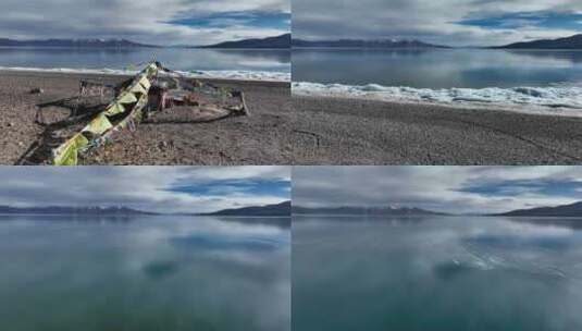 航拍西藏那曲当惹雍措湖畔的经幡高清在线视频素材下载