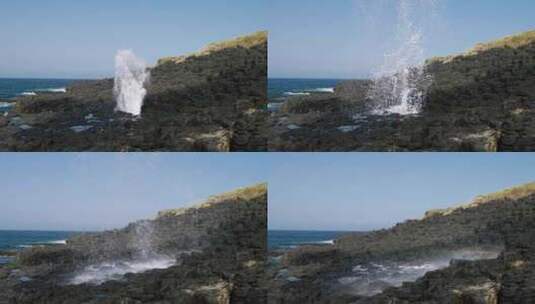 水从海上的岩石之间直接喷向空中高清在线视频素材下载