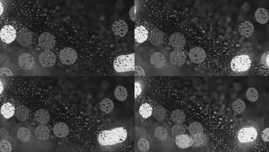车窗玻璃上的雨滴光斑画面高清在线视频素材下载