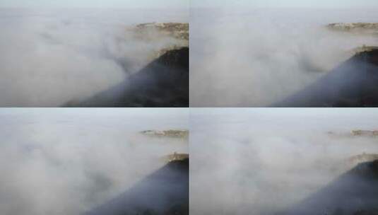 山脉日出时沿海雾的特写高清在线视频素材下载