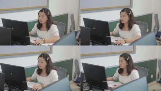 办公司里画图工作的女孩高清在线视频素材下载