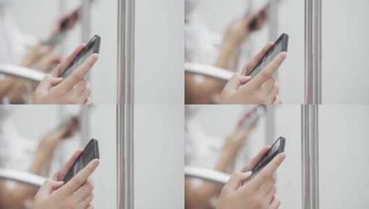 地铁上使用手机玩手机刷手机高清在线视频素材下载