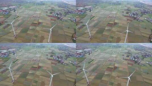 西昌农田里的风力发电机组高清在线视频素材下载