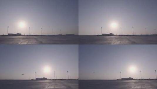 大兴机场黎明 飞机迎太阳起飞 停机坪角度高清在线视频素材下载