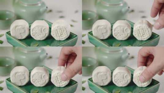 拿中秋节港式绿茶月饼吃高清在线视频素材下载