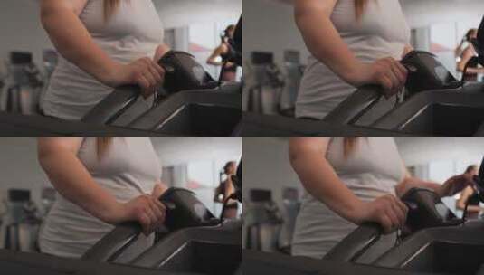 跑步机上的微胖女人高清在线视频素材下载