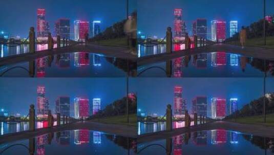 义乌江滨夜晚大量人群休闲散步延时摄影高清在线视频素材下载