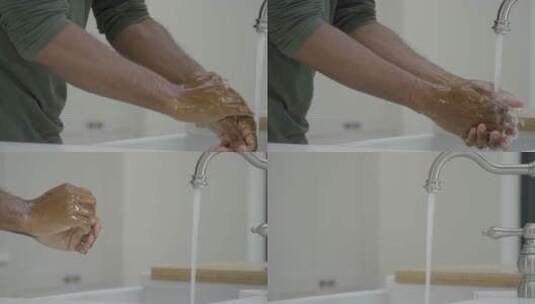 在水龙头下洗手的男人高清在线视频素材下载