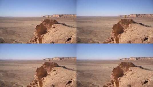 站在沙漠悬崖上的女人高清在线视频素材下载