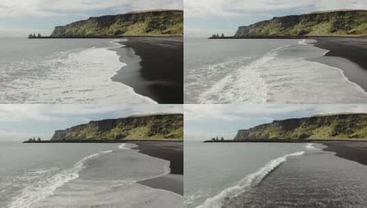 海浪向前移动的黑色沙滩航拍高清在线视频素材下载