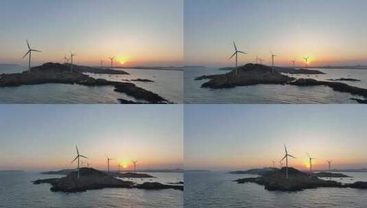 日出海上风车航拍夕阳风车发电风能海上岛屿高清在线视频素材下载