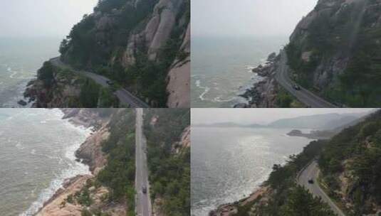 青岛航拍海岸线周边公路汽车行驶大景别高清在线视频素材下载