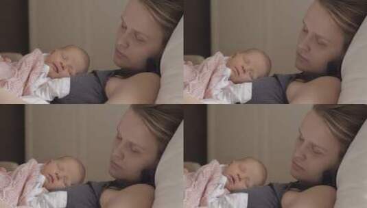 母亲和新生的女儿睡在一起高清在线视频素材下载