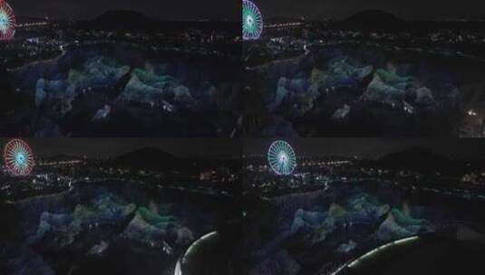 航拍上海佘山世茂洲际酒店山水画灯光秀高清在线视频素材下载