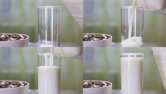 在木制桌子上用玻璃倒牛奶高清在线视频素材下载