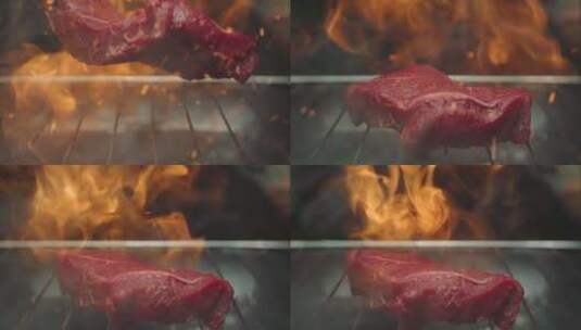 不锈钢烤肉仓库的烤肉牛排，深色背景下着火高清在线视频素材下载