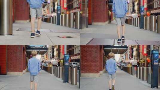 穿着短裤的男孩走在纽约市街上高清在线视频素材下载