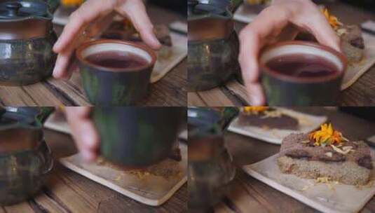 茶道。将红茶从茶壶倒入杯子。高清在线视频素材下载