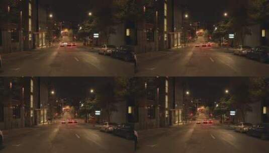 在大楼附近的城市街道上行驶的汽车停了一夜高清在线视频素材下载