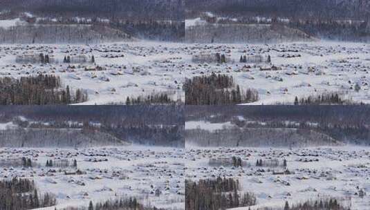 航拍新疆禾木雪景森林雪地小木屋禾木桥雪山高清在线视频素材下载