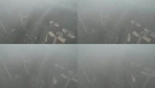 雨雾中的城市道路航拍高清在线视频素材下载