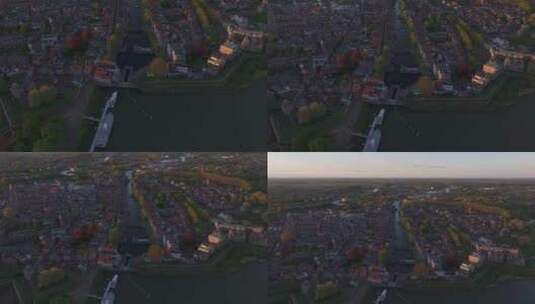 鸟瞰城市，河流，日落时的建筑，荷兰。高清在线视频素材下载