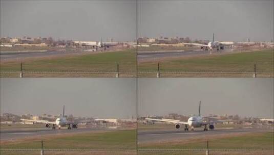 一架商用飞机降落在机场高清在线视频素材下载