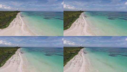 蓝天白云浪漫的沙滩航拍海岸线高清在线视频素材下载