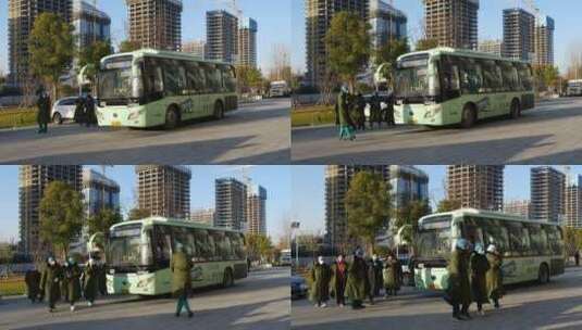 武汉疫情封城 方舱医护人员下大巴车上班高清在线视频素材下载