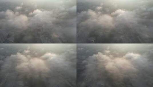 航拍山东省荣成市城市上空的平流雾高清在线视频素材下载