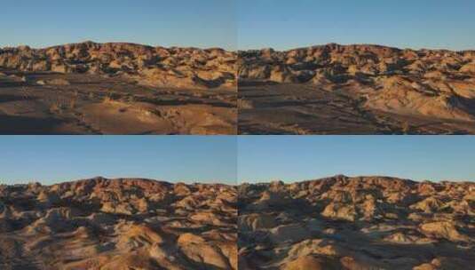 日落时分的新疆昌吉奇台魔鬼城戈壁丹霞地貌高清在线视频素材下载