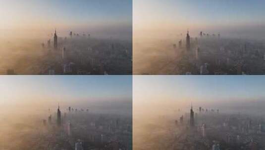 航拍日出平流雾下的南京城市风光高清在线视频素材下载