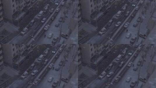 俯拍下雪天城市道路高清在线视频素材下载