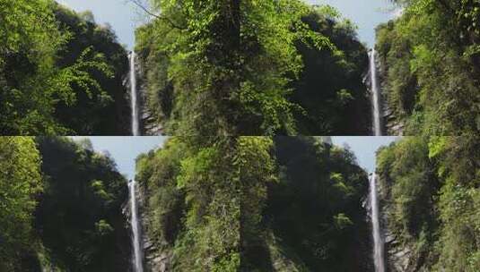 春天阳光下航拍大山瀑布自然风光高清在线视频素材下载