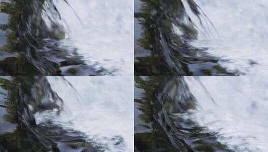天然清澈的泉水流淌在岩石上高清在线视频素材下载