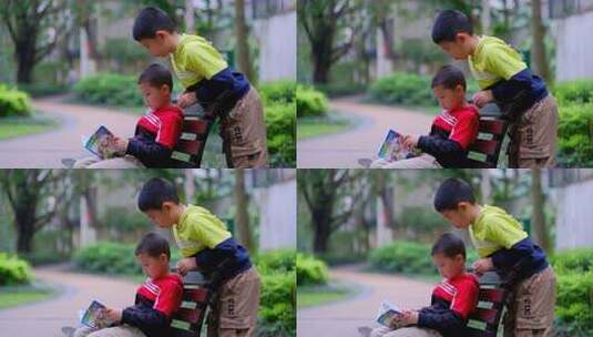 两个小朋友在公园长椅看漫画书高清在线视频素材下载
