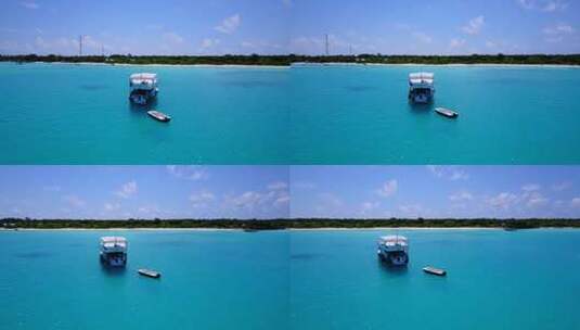 白天鸟瞰复制空间拍摄的白沙天堂海滩和水蓝色的水背景高清在线视频素材下载