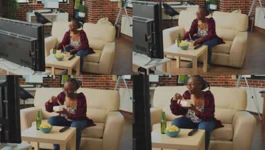 用筷子吃面条的非裔女孩高清在线视频素材下载