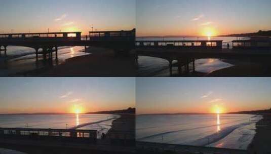 航拍吊桥上的日落景观高清在线视频素材下载