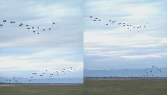 伞兵从军用飞机上跳下来的镜头高清在线视频素材下载