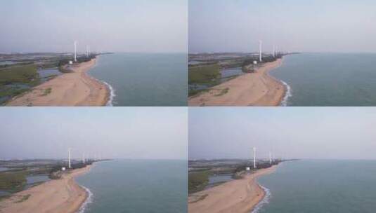 横移海边沙滩风力大风车高清在线视频素材下载